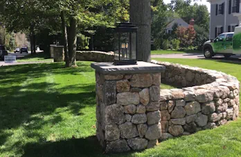 Elegant stacked stone column with lantern in Wellesley, Massachusetts