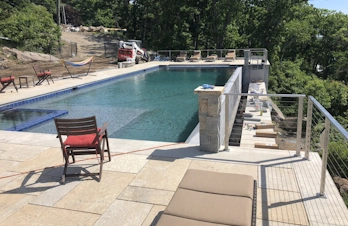 Infinity pool with a waterfall edge in Gloucester, Massachusetts