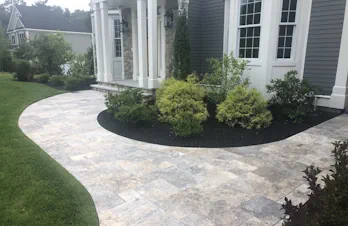 Groton, Mass - Stone veneer on face of house and columns with blue stone cap and tile.